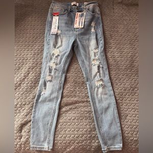 Light blue ripped jeans